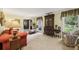 Cozy living room featuring a comfortable sofa, armchair, and decorative furnishings at 1487 W Bend Creek Ct, Atlanta, GA 30338