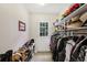 Functional mud room with shelving and storage for shoes, coats, and accessories at 1487 W Bend Creek Ct, Atlanta, GA 30338