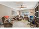 Comfortable home office setup with ample space and a relaxing sitting area by the window at 1487 W Bend Creek Ct, Atlanta, GA 30338