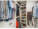 Organized walk-in closet featuring shelving, drawers, and ample space for clothes, shoes, and accessories at 3233 Osborne Ne Rd, Brookhaven, GA 30319