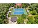 A view of community tennis and basketball courts, surrounded by trees at 3233 Osborne Ne Rd, Brookhaven, GA 30319