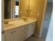Bathroom features a double vanity, granite countertops, and ample storage space at 4663 Mossey Dr, Lithonia, GA 30038