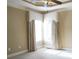 Cozy bedroom with neutral walls, carpet, and custom window treatments at 4663 Mossey Dr, Lithonia, GA 30038