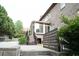 Multi-level wooden deck, offering ample outdoor space and backyard access at 4663 Mossey Dr, Lithonia, GA 30038