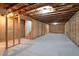 Unfinished basement offers potential with open layout, exposed ceiling, and framing in place at 3692 Wartrace Dr, South Fulton, GA 30331