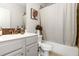 Modern bathroom with a shower-tub combo, updated vanity, and stylish decor at 3692 Wartrace Dr, South Fulton, GA 30331