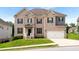 Beautiful two-story brick home featuring a manicured lawn and attached two car garage at 3692 Wartrace Dr, South Fulton, GA 30331