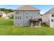 Rear exterior showcasing deck, well-maintained lawn, and the home's architectural features at 3692 Wartrace Dr, South Fulton, GA 30331