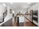 Bright, open kitchen with stainless steel appliances and granite countertops offers an airy feel at 3692 Wartrace Dr, South Fulton, GA 30331