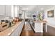 Bright, spacious kitchen features granite counters, stainless appliances, and large center island with seating at 3692 Wartrace Dr, South Fulton, GA 30331