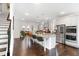 Modern kitchen with stainless appliances, granite countertops, and a large center island with seating at 3692 Wartrace Dr, South Fulton, GA 30331