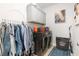 Well-organized laundry room with modern washer and dryer, upper cabinets, and stylish decor at 3692 Wartrace Dr, South Fulton, GA 30331