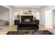 Comfortable main bedroom featuring a luxurious dark bed frame, soft carpet, and a serene ambiance at 3692 Wartrace Dr, South Fulton, GA 30331