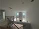 A view from above looking down into a two story great room with a fireplace and windows at 5361 Tuscany Dr, Douglasville, GA 30135