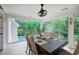 Bright dining area with backyard and pool views through large windows, perfect for entertaining at 6095 Fords Nw Rd, Acworth, GA 30101