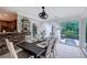 Eat in dining area with backyard views, and access to kitchen with stone accent wall at 6095 Fords Nw Rd, Acworth, GA 30101