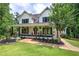 Inviting two-story home with a spacious front porch at 6095 Fords Nw Rd, Acworth, GA 30101