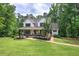 Beautiful two-story home with a well-manicured lawn at 6095 Fords Nw Rd, Acworth, GA 30101