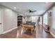 Game room features hardwood floors, pool table, with easy access to multiple rooms at 6095 Fords Nw Rd, Acworth, GA 30101