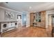 Open concept living space with hardwood floors and custom built-in cabinets and drawers at 6095 Fords Nw Rd, Acworth, GA 30101