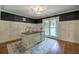 Bright office features a large window and a custom desk with wainscoting at 6095 Fords Nw Rd, Acworth, GA 30101