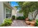 Charming backyard featuring a patio with seating area, and lush greenery at 859 Scales Rd, Suwanee, GA 30024