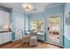 Charming breakfast nook with lots of natural light and easy access to the backyard at 859 Scales Rd, Suwanee, GA 30024