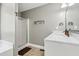 Bathroom with white vanity, quartz countertop, shower, and tile flooring at 115 Bennett Farms Dr, Acworth, GA 30102
