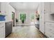 Bright kitchen with plenty of natural light, stainless steel appliances, and tile flooring at 115 Bennett Farms Dr, Acworth, GA 30102