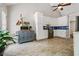 Bright kitchen with white cabinetry, stainless steel appliances, and tile flooring at 115 Bennett Farms Dr, Acworth, GA 30102