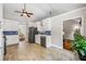 Open kitchen featuring tile floors, stainless steel appliances, and a view into the living room at 115 Bennett Farms Dr, Acworth, GA 30102
