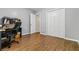 This home office features tile floors, a closet, a desk and a book shelf at 115 Bennett Farms Dr, Acworth, GA 30102