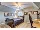 Bedroom featuring a bed, study desk, and decoratively adorned walls at 2230 Laurel Lake Dr, Suwanee, GA 30024