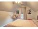 Bedroom features starry ceiling, hammock and playful wall decor at 2230 Laurel Lake Dr, Suwanee, GA 30024