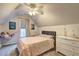 Bedroom features starry ceiling, dresser and playful wall decor at 2230 Laurel Lake Dr, Suwanee, GA 30024