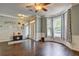 Welcoming foyer with hardwood floors, ample natural light, and charming decorative accents at 2230 Laurel Lake Dr, Suwanee, GA 30024