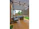 View of a cozy patio with pergola, with a lounge area perfect for entertaining guests at 2230 Laurel Lake Dr, Suwanee, GA 30024