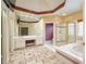 Primary bathroom featuring a jacuzzi tub, walk-in shower, dual sinks, and tiled flooring at 6065 Standard View Dr, Duluth, GA 30097