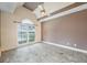 Bright bedroom with lots of light, sleek wood floors, and a modern ceiling fan at 6065 Standard View Dr, Duluth, GA 30097