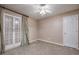 Bedroom with carpet, ceiling fan, and natural light, perfect for a peaceful retreat at 6065 Standard View Dr, Duluth, GA 30097
