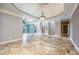 Bright open concept living space with tile floors, recessed lighting and neutral paint colors at 6065 Standard View Dr, Duluth, GA 30097