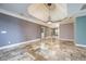 Open concept living area with tile floors, recessed lighting, tray ceilings, and neutral paint colors at 6065 Standard View Dr, Duluth, GA 30097