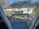 View of a fenced backyard from the home's back deck at 1457 Richland Road Southwest, Atlanta, GA 30310