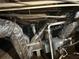 Pipes and HVAC ductwork in the unfinished basement at 1457 Richland Road Southwest, Atlanta, GA 30310