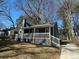 Charming single Gathering home featuring craftsman style architecture and a covered porch at 1457 Richland Road Southwest, Atlanta, GA 30310