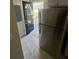 A black front door is visible from the kitchen and appliances at 1457 Richland Road Southwest, Atlanta, GA 30310