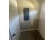 Hallway features tile flooring and an electric panel at 1457 Richland Road Southwest, Atlanta, GA 30310