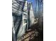 View of the home's side exterior and a small yard at 1457 Richland Road Southwest, Atlanta, GA 30310