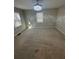 Bedroom with plush carpeting, two windows for natural light, and neutral wall paint at 1457 Richland Sw Rd, Atlanta, GA 30310