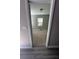 Bedroom with neutral carpet and walls as seen through an open doorway at 1457 Richland Sw Rd, Atlanta, GA 30310